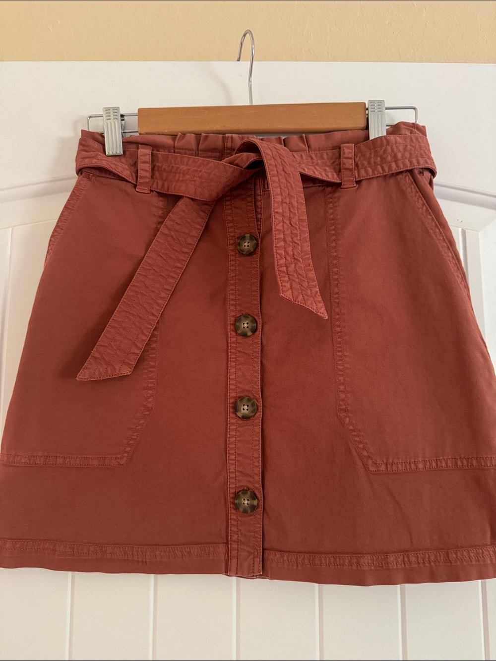 Button-front mini skirt with belt